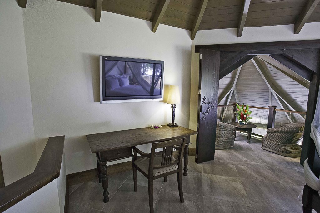 image of the private lounge in the master bedroom of the Premium Lagoon View Villa