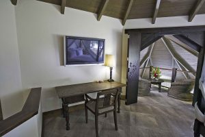 image of the private lounge in the master bedroom of the Premium Lagoon View Villa