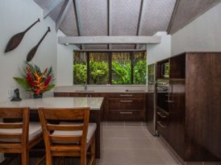 Image of the Premium Garden Villa showcasing its built-in kitchen and dining area