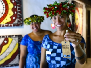 image of the Pacific Resort room key modelled by two beautiful Guest Services Agents