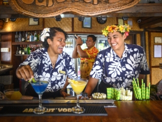 image of a friendly bartenders enjoy serving cocktail at Barefoot Bar